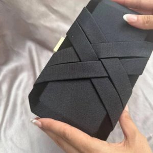crossed satin clutch in black